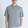 POLO RELAXED FIT DE ALGODÓN CON MOTIVO DE ESTIPES Y LOGOTIPO BORDADO