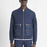CHAQUETA EN TEJIDO IMPERMEABLE CON LOGOTIPO BORDADO EN EL PECHO