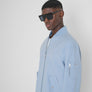 CHAQUETA REGULAR FIT DE COLOR LISO DE TEJIDO RIPSTOP