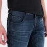 JEANS OZZY TAPERED FIT IN COATED DARK BLUE DENIM