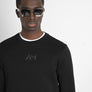 SUDADERA REGULAR FIT CON EFECTO ANTE CON INSERCIONES DE PIEL SINTÉTICA