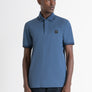 POLO REGULAR FIT DE ALGODÓN AZUL Y CON LOGOTIPO RESALTADO