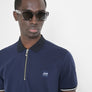 POLO REGULAR FIT DE ALGODÓN 100 % CON CREMALLERA Y PARCHE CON LOGOTIPO EN EL PECHO