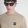 T-SHIRT REGULAR FIT DE PUNTO DE ALGODÓN PURO DE COLOR LISO CON LOGOTIPO EN RELIEVE TONO SOBRE TONO