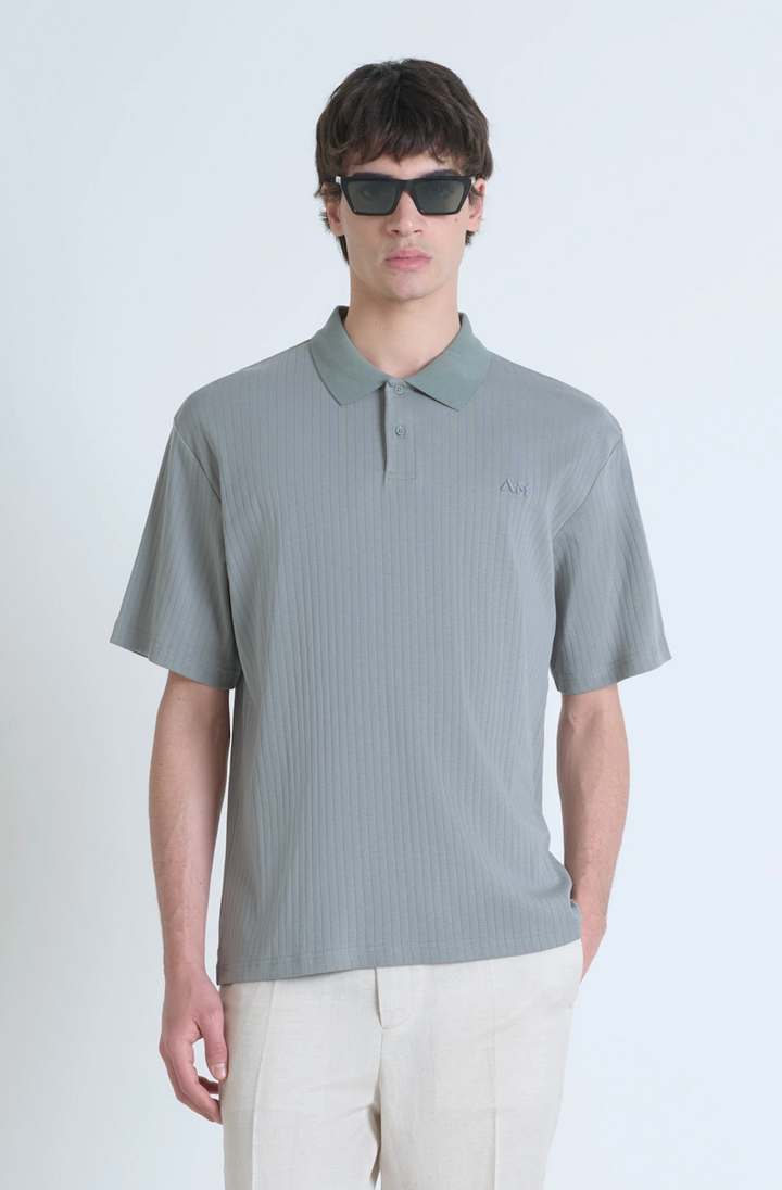 POLO RELAXED FIT DE ALGODÓN CON MOTIVO DE ESTIPES Y LOGOTIPO BORDADO