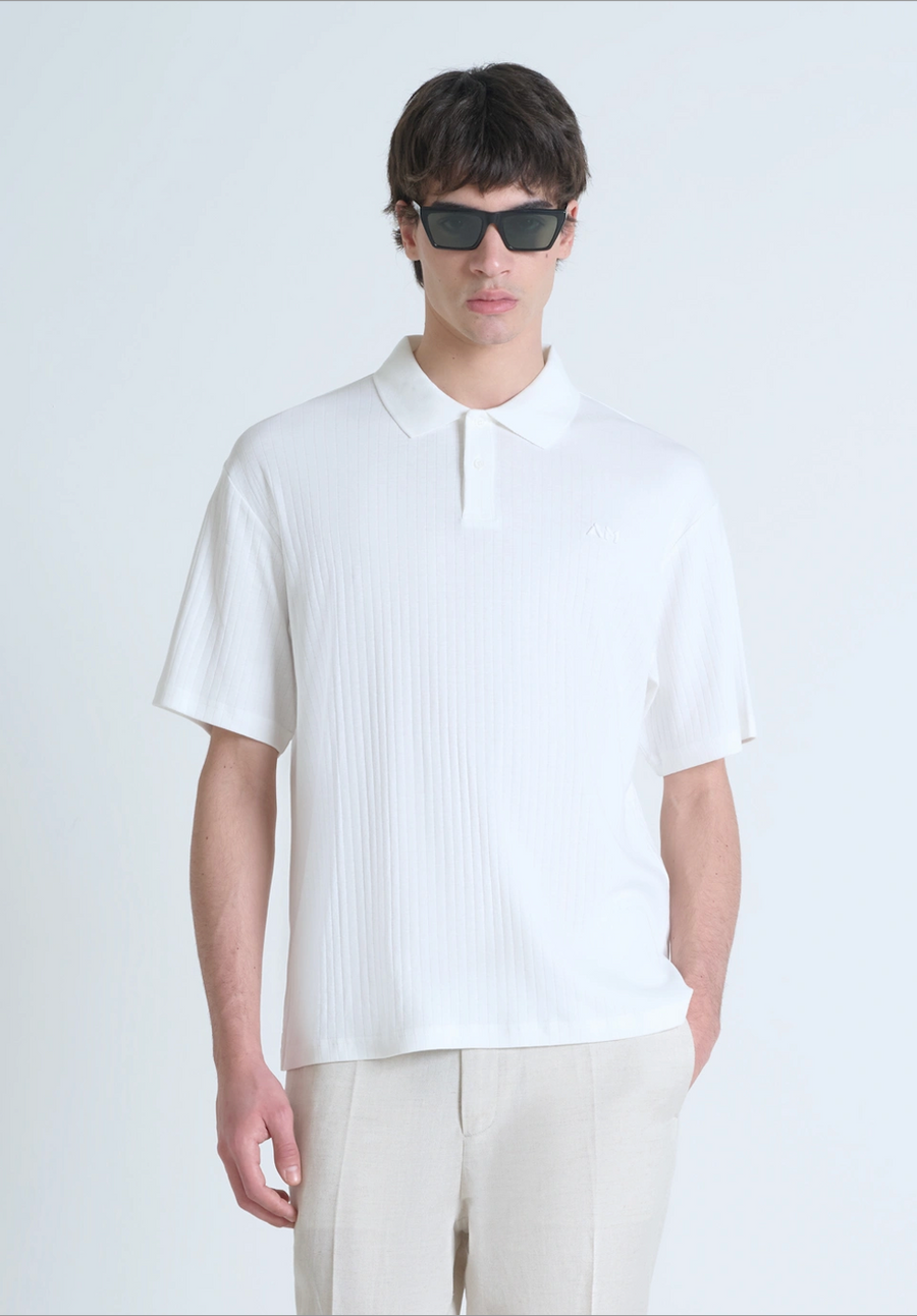 POLO RELAXED FIT DE ALGODÓN CON MOTIVO DE ESTIPES Y LOGOTIPO BORDADO