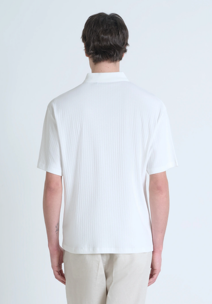 POLO RELAXED FIT DE ALGODÓN CON MOTIVO DE ESTIPES Y LOGOTIPO BORDADO