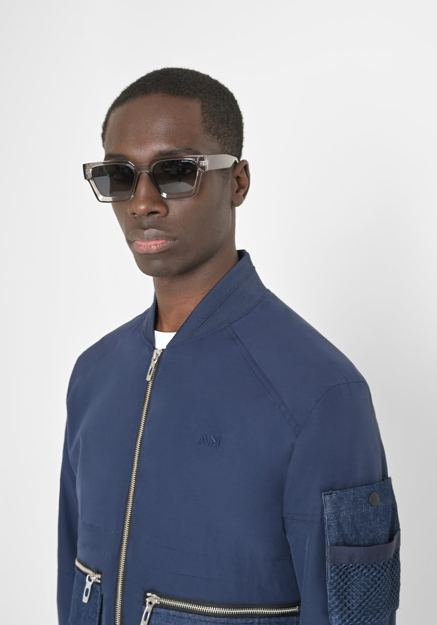 CHAQUETA EN TEJIDO IMPERMEABLE CON LOGOTIPO BORDADO EN EL PECHO