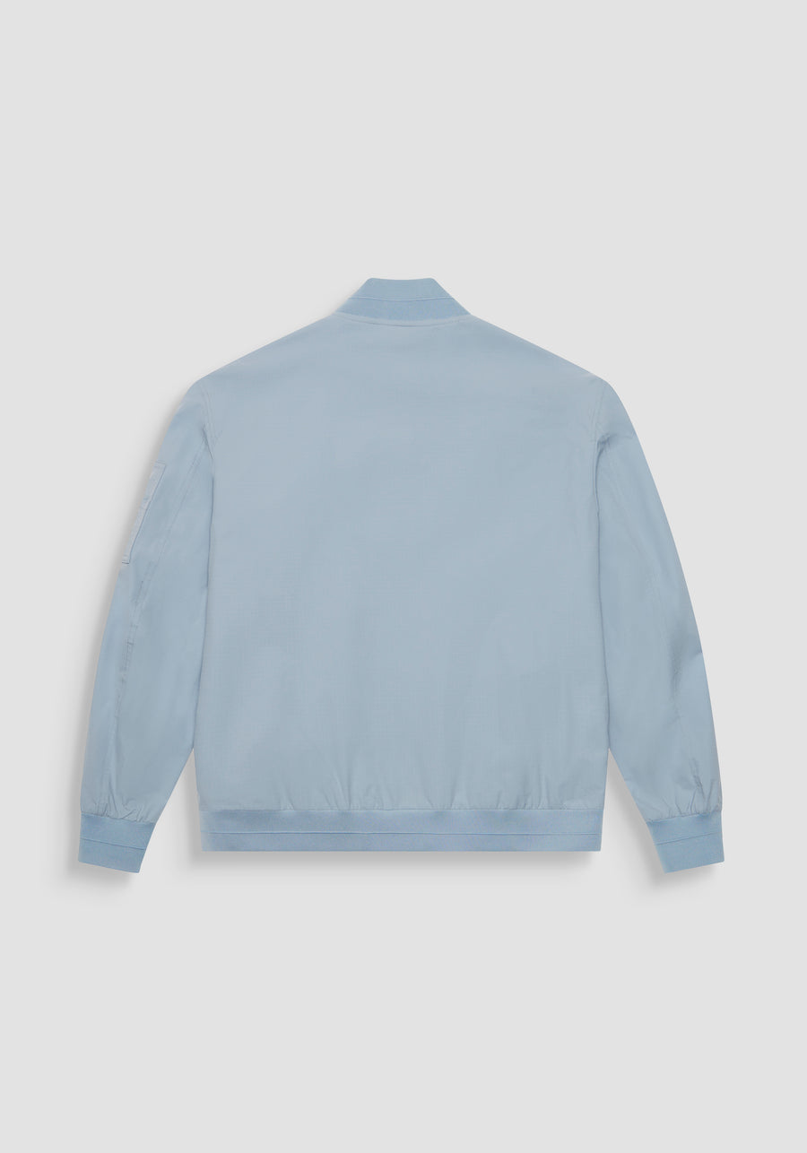 CHAQUETA REGULAR FIT DE COLOR LISO DE TEJIDO RIPSTOP