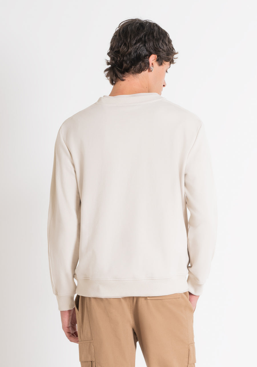 SUÉTER RELAXED FIT BEIGE DE ALGODÓN Y LOGOTIPO DE GOMA