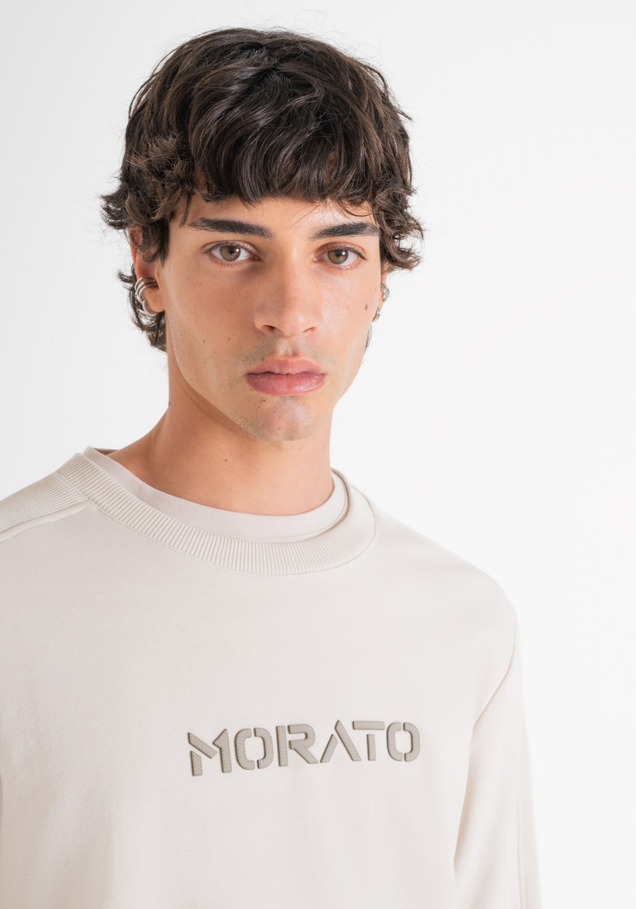 SUÉTER RELAXED FIT BEIGE DE ALGODÓN Y LOGOTIPO DE GOMA