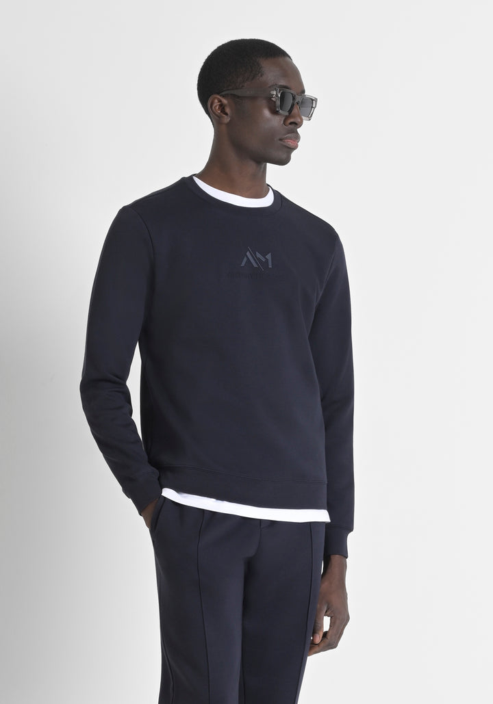SUDADERA REGULAR FIT CON EFECTO ANTE CON INSERCIONES DE PIEL SINTÉTICA