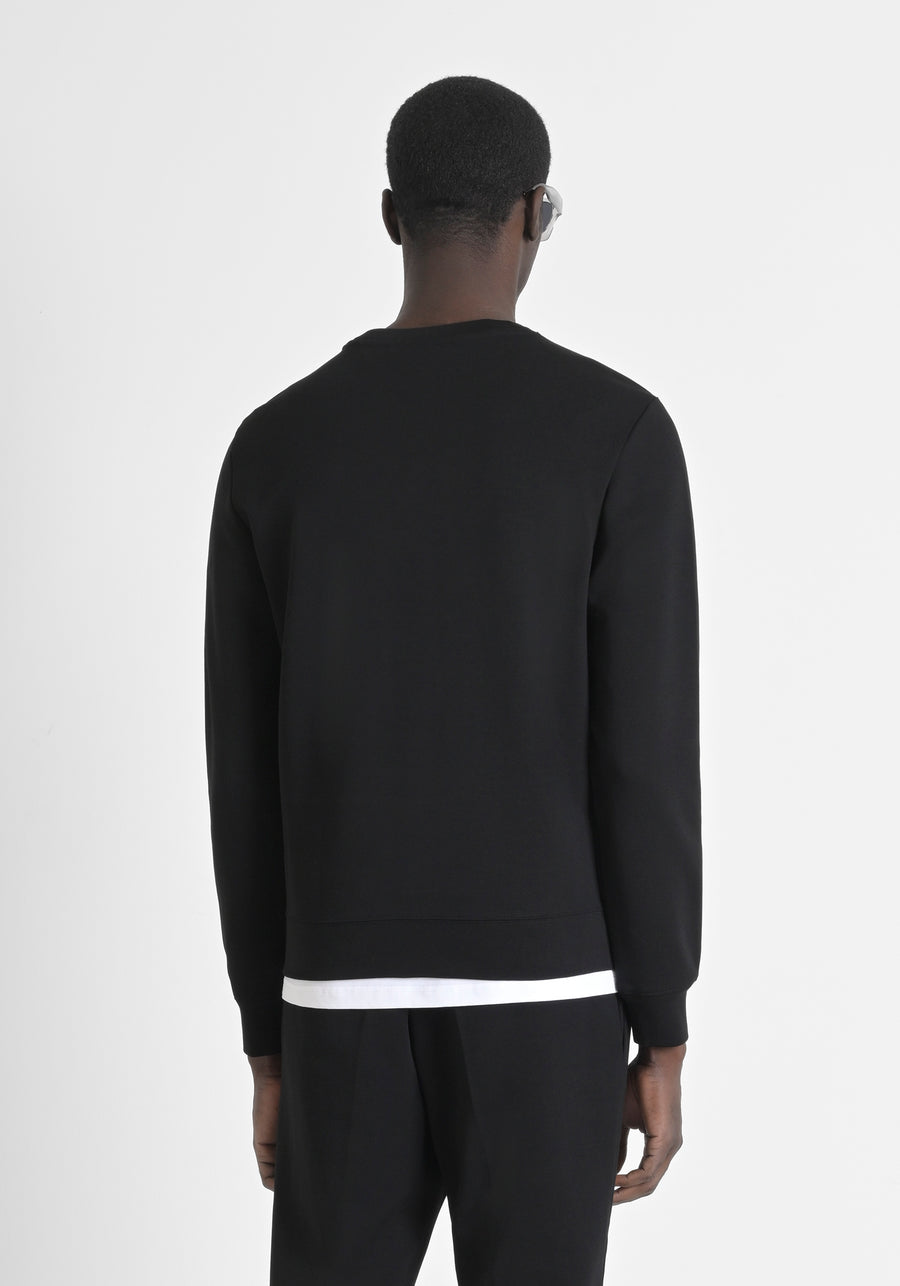 SUDADERA REGULAR FIT CON EFECTO ANTE CON INSERCIONES DE PIEL SINTÉTICA