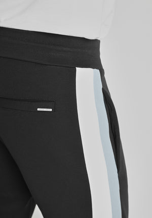 PANTS SLIM FIT DE MEZCLA DE ALGODÓN CON BANDAS BICOLOR EN CONTRASTE