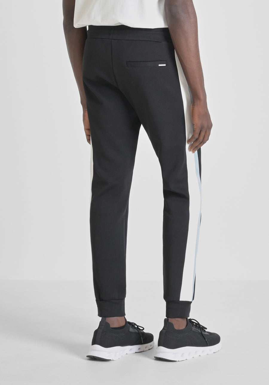 PANTS SLIM FIT DE MEZCLA DE ALGODÓN CON BANDAS BICOLOR EN CONTRASTE