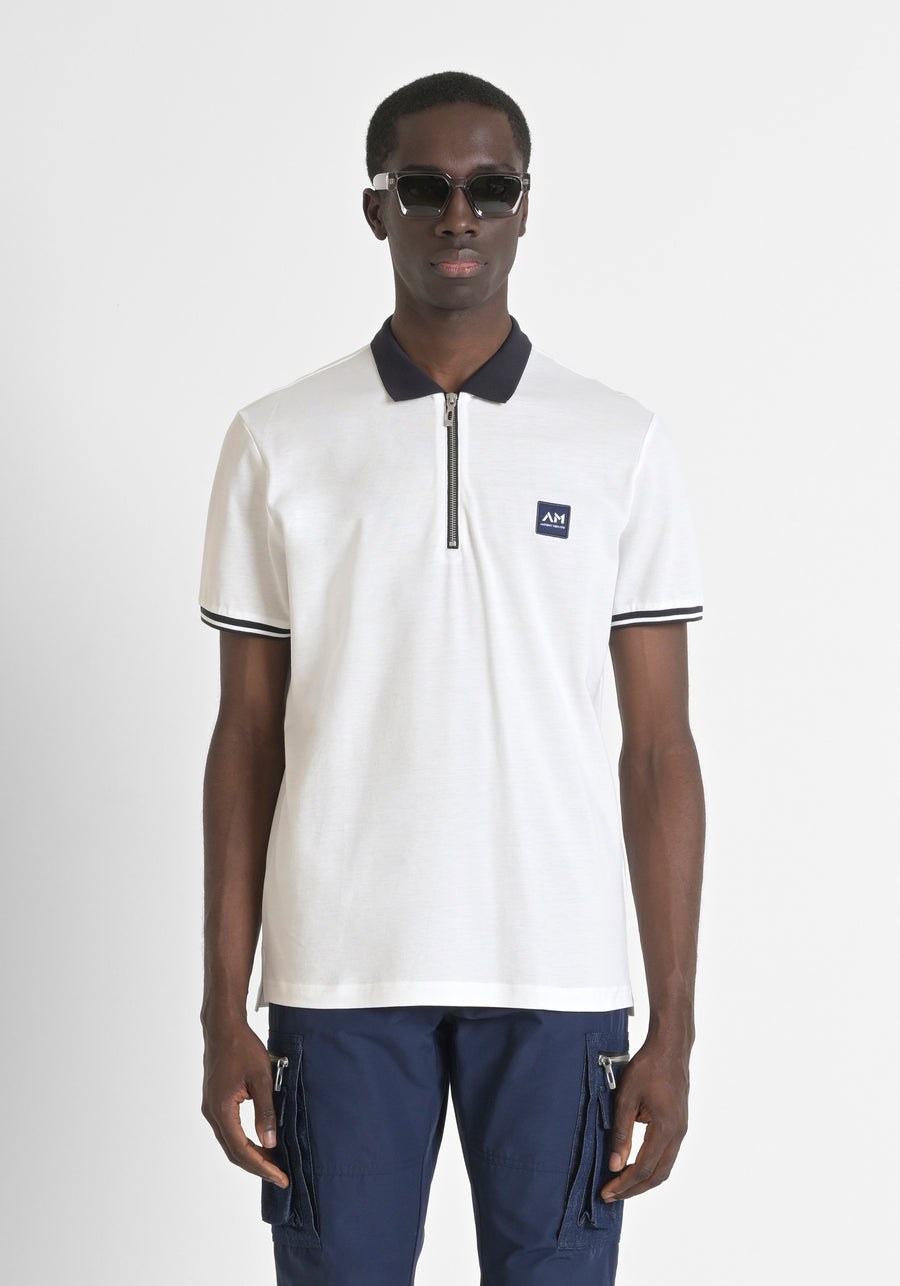 POLO REGULAR FIT DE ALGODÓN 100 % CON CREMALLERA Y PARCHE CON LOGOTIPO EN EL PECHO