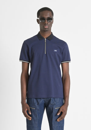 POLO REGULAR FIT DE ALGODÓN 100 % CON CREMALLERA Y PARCHE CON LOGOTIPO EN EL PECHO