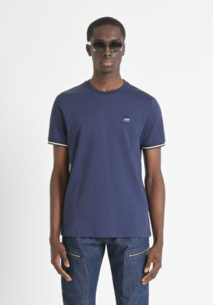CAMISETA REGULAR FIT DE PUNTO DE ALGODÓN 100 % CON PARCHE CON EL LOGOTIPO Y DETALLES EN CONTRASTE