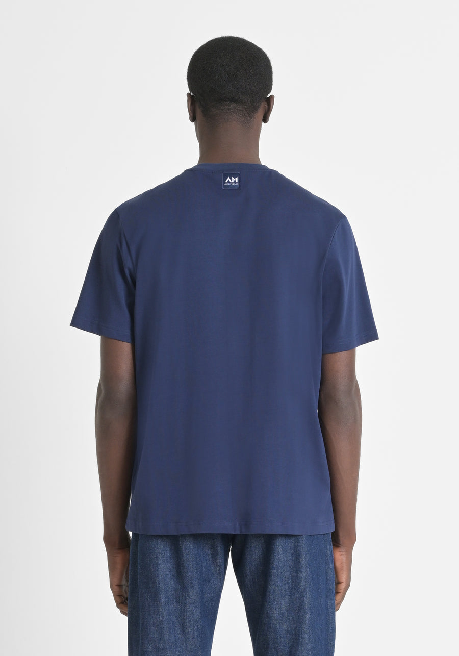 CAMISETA RELAXED FIT DE ALGODÓN CON DOBLE BOLSILLO