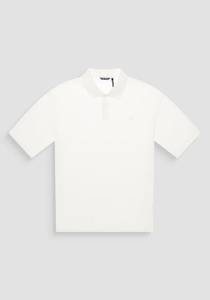 POLO RELAXED FIT DE ALGODÓN CON MOTIVO DE ESTIPES Y LOGOTIPO BORDADO