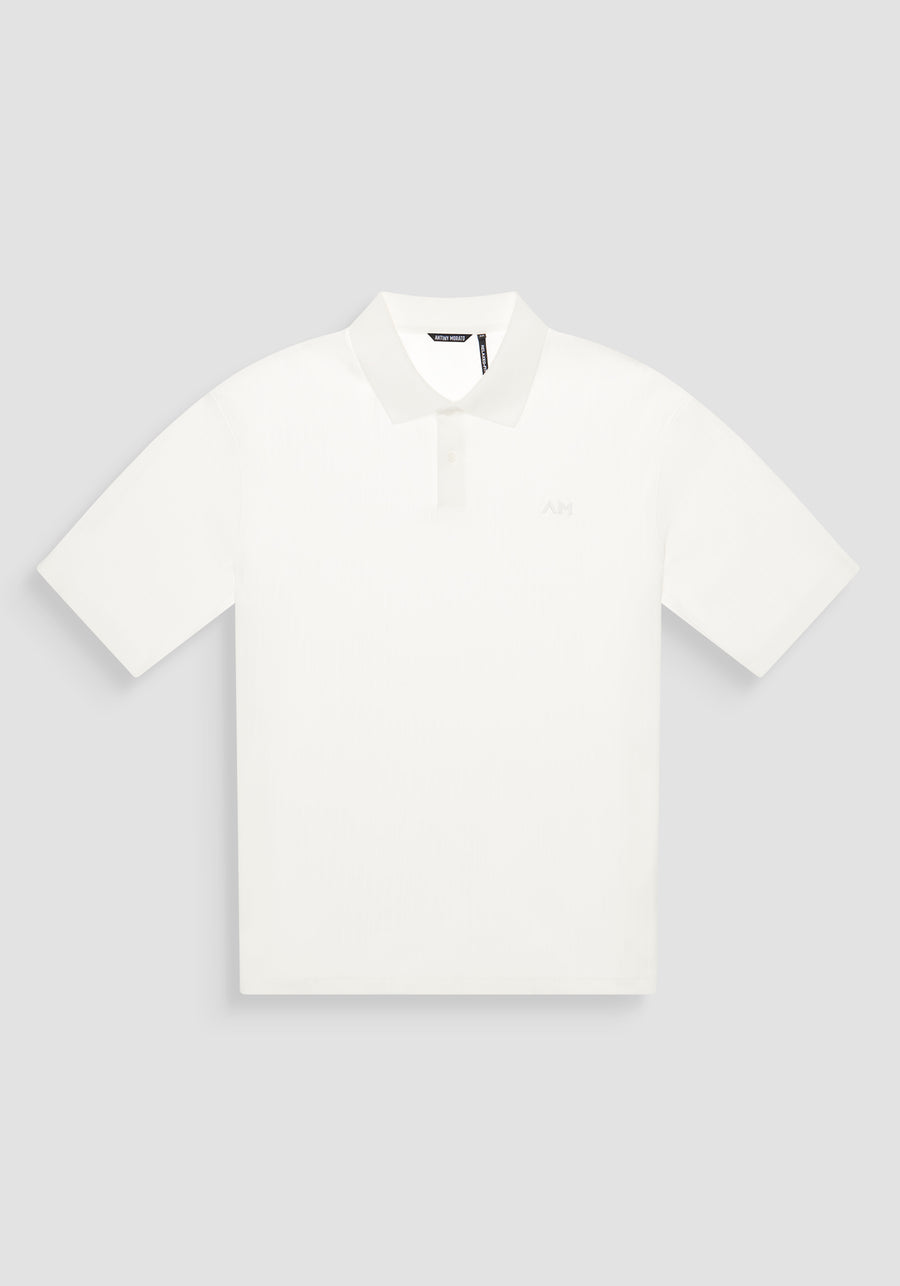 POLO RELAXED FIT DE ALGODÓN CON MOTIVO DE ESTIPES Y LOGOTIPO BORDADO