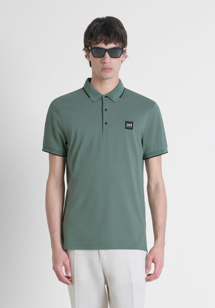 POLO SLIM FIT DE PURO ALGODÓN CON PATRÓN GEOMÉTRICO INTEGRAL Y LOGOTIPO EN RELIEVE VERDE