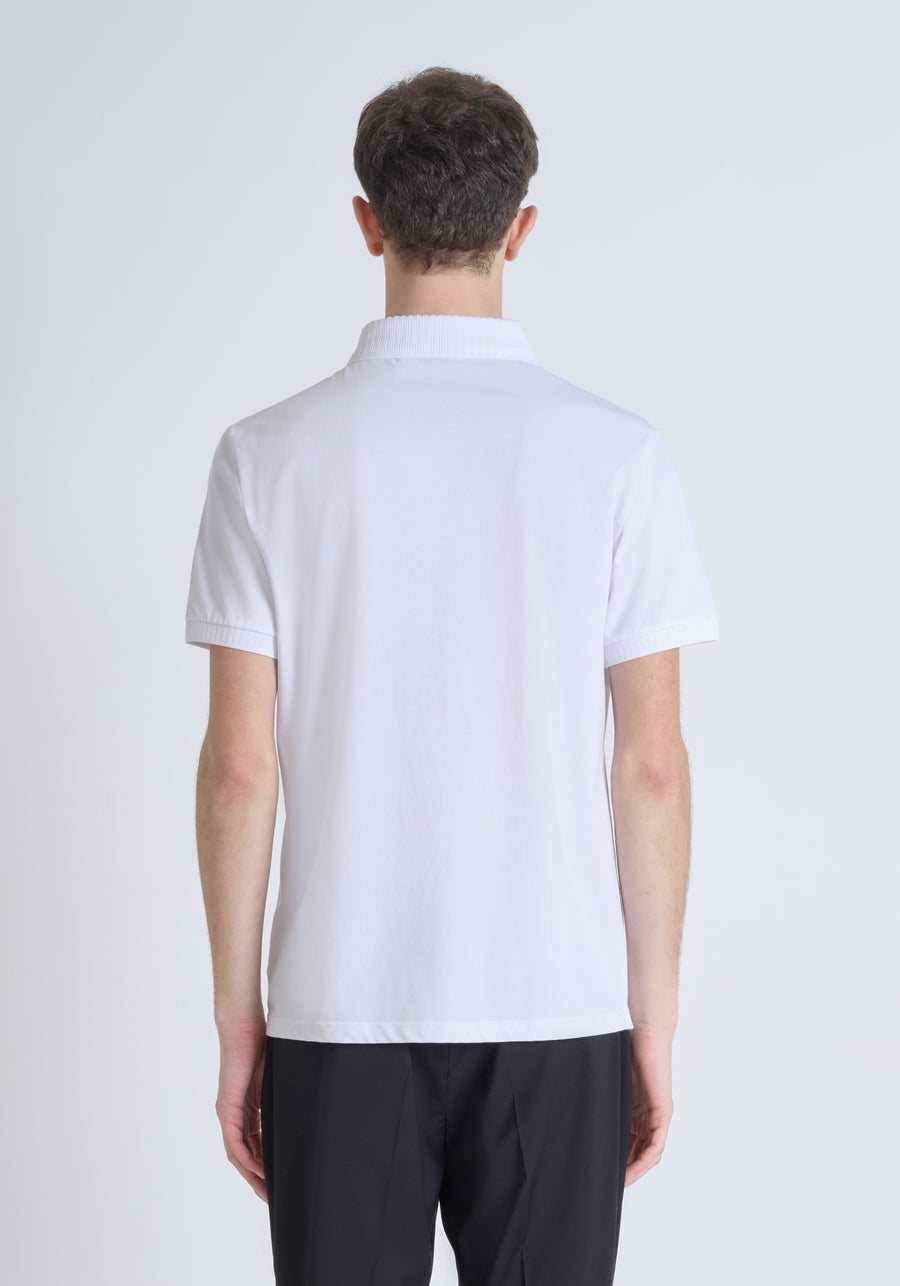 POLO REGULAR FIT DE PUNTO DE ALGODÓN CON ESTAMPADO DE TIGRE REFLECTANTE Y LOGOTIPO EN LA PARTE TRASERA