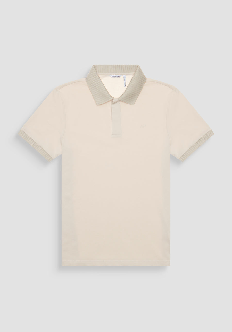 POLO REGULAR FIT DE PUNTO DE ALGODÓN CON ESTAMPADO DE TIGRE REFLECTANTE Y LOGOTIPO EN LA PARTE TRASERA