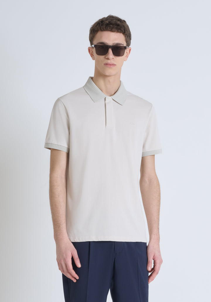 POLO REGULAR FIT DE PUNTO DE ALGODÓN CON ESTAMPADO DE TIGRE REFLECTANTE Y LOGOTIPO EN LA PARTE TRASERA