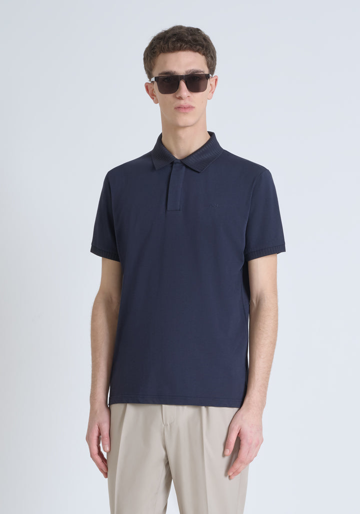 POLO REGULAR FIT DE PUNTO DE ALGODÓN CON ESTAMPADO DE TIGRE REFLECTANTE Y LOGOTIPO EN LA PARTE TRASERA