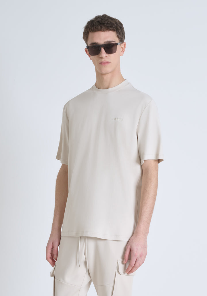T-SHIRT RELAXED FIT DE PUNTO DE ALGODÓN PURO CON ESTAMPADO MINIMALISTA Y LOGOTIPO EN LA PARTE TRASERA