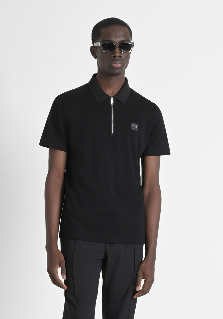 POLO REGULAR FIT DE PUNTO DE ALGODÓN 100 % CON PARCHE COSIDO Y MONOGOTIPO EN CONTRASTE