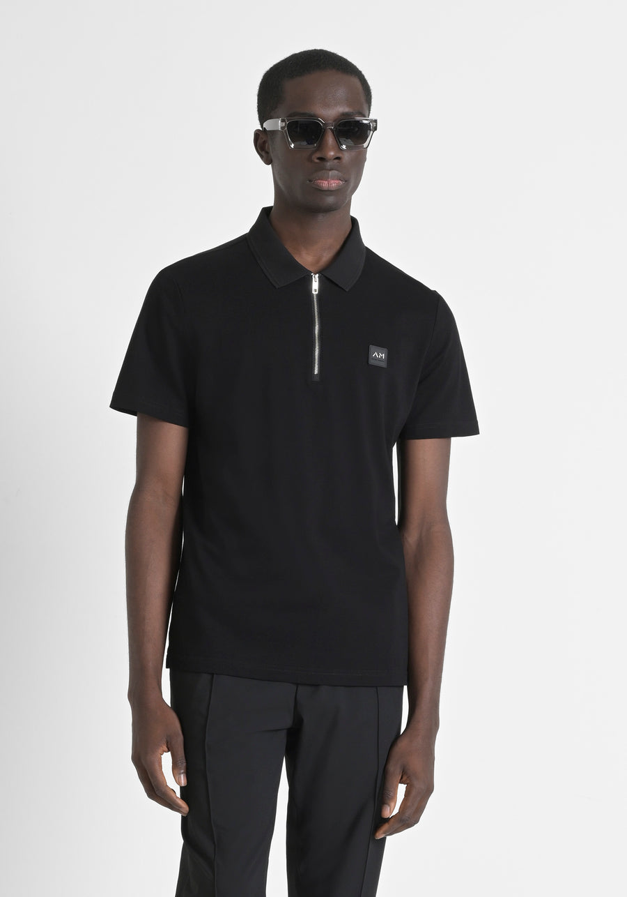 POLO REGULAR FIT DE PUNTO DE ALGODÓN 100 % CON PARCHE COSIDO Y MONOGOTIPO EN CONTRASTE