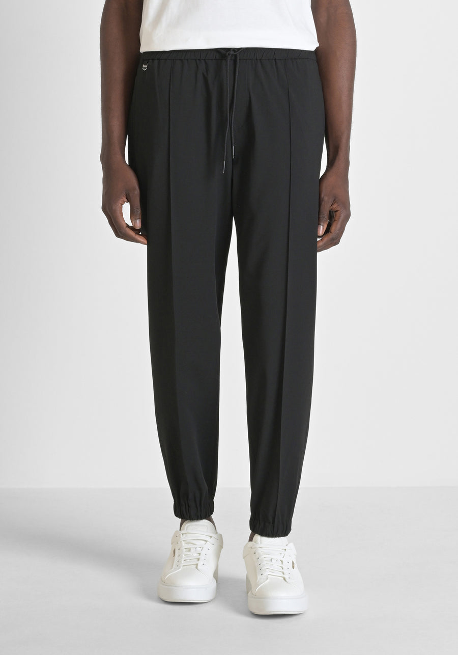 PANTALONES REGULAR FIT «NATE» DE MEZCLA DE VISCOSA ELÁSTICA
