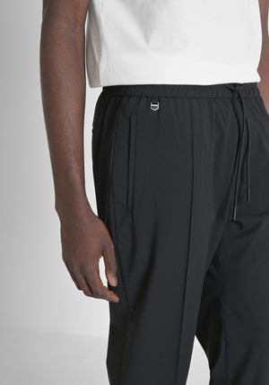 PANTALONES REGULAR FIT «NATE» DE MEZCLA DE VISCOSA ELÁSTICA