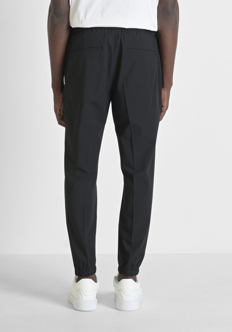 PANTALONES REGULAR FIT «NATE» DE MEZCLA DE VISCOSA ELÁSTICA